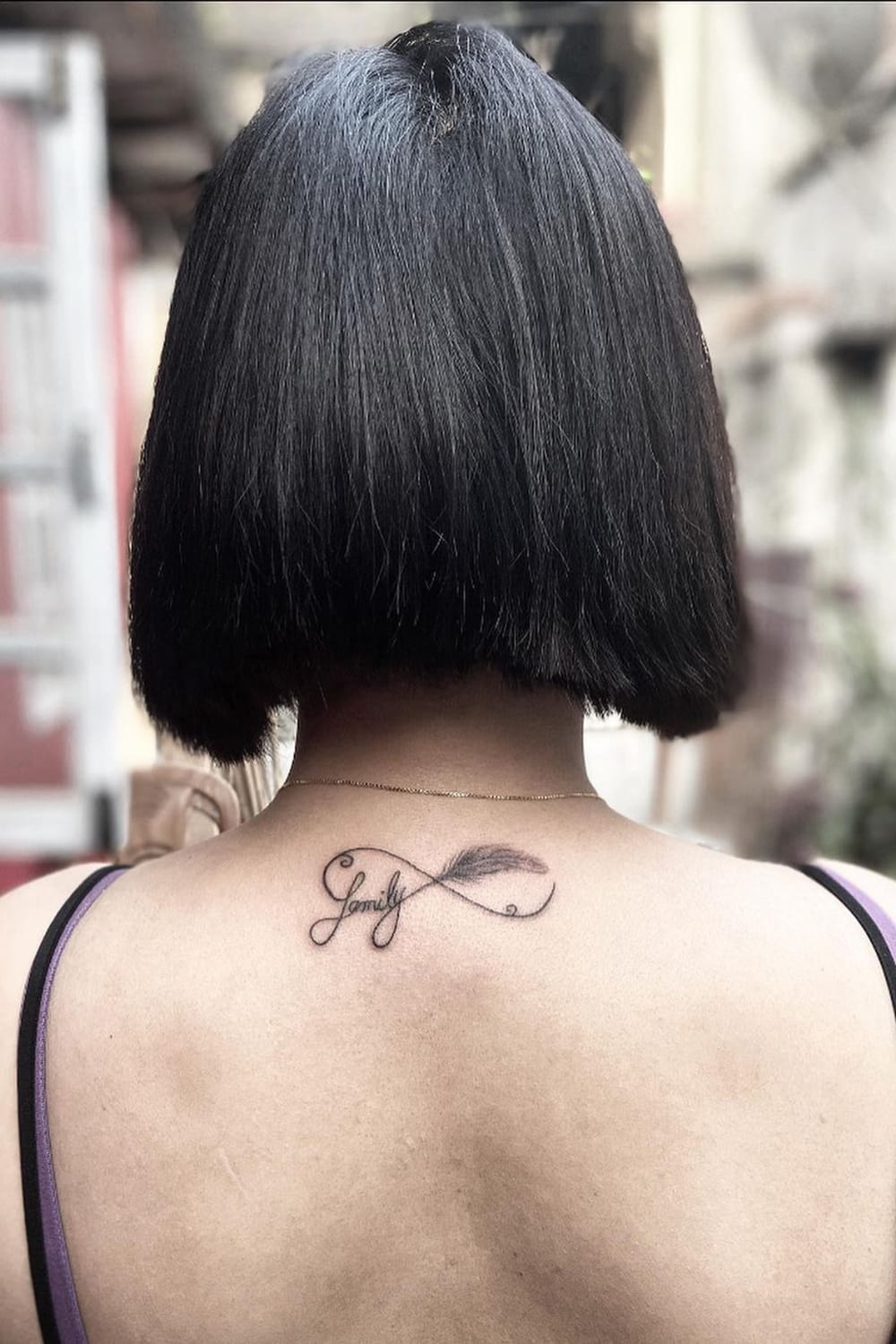 Feather infinity tattoo