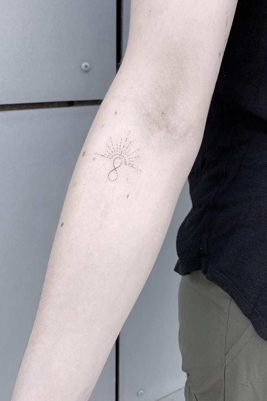 Glittering infinity tattoo