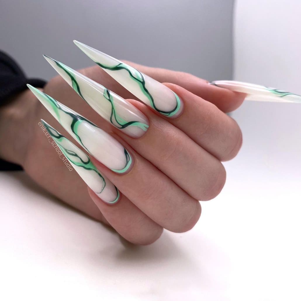 Long stiletto nails with green curves