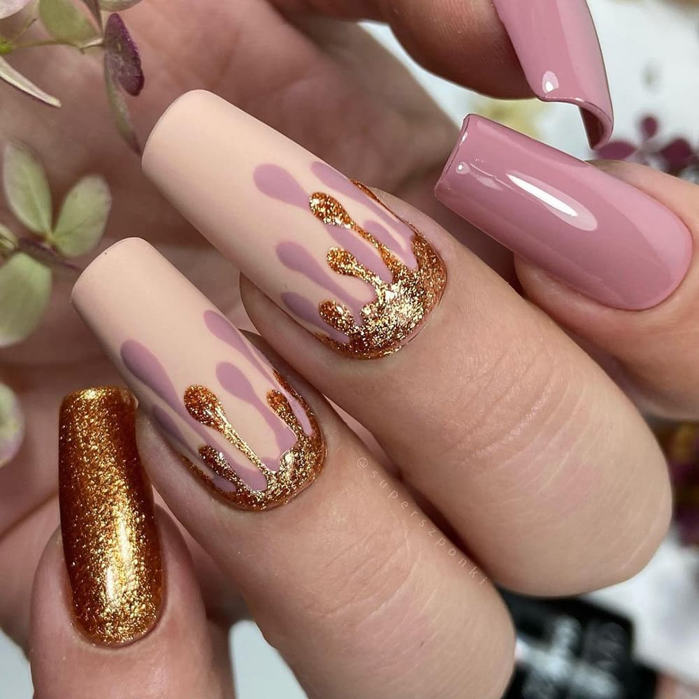 Nails with golden powder
