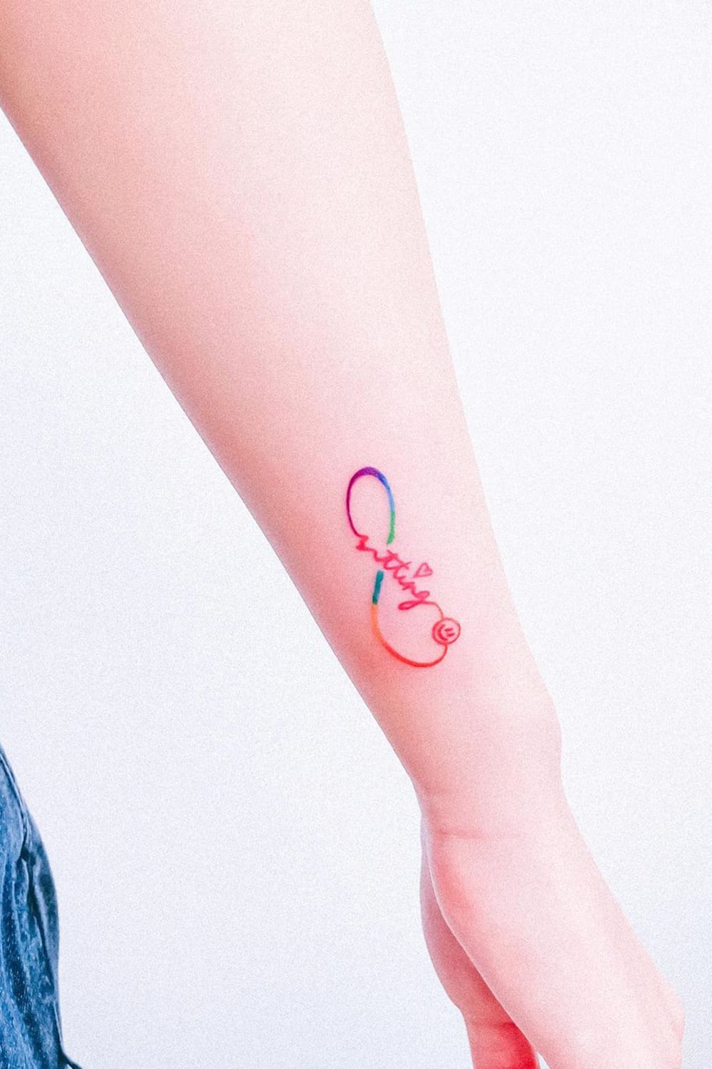 Smiley Rainbow Infinity Tattoo