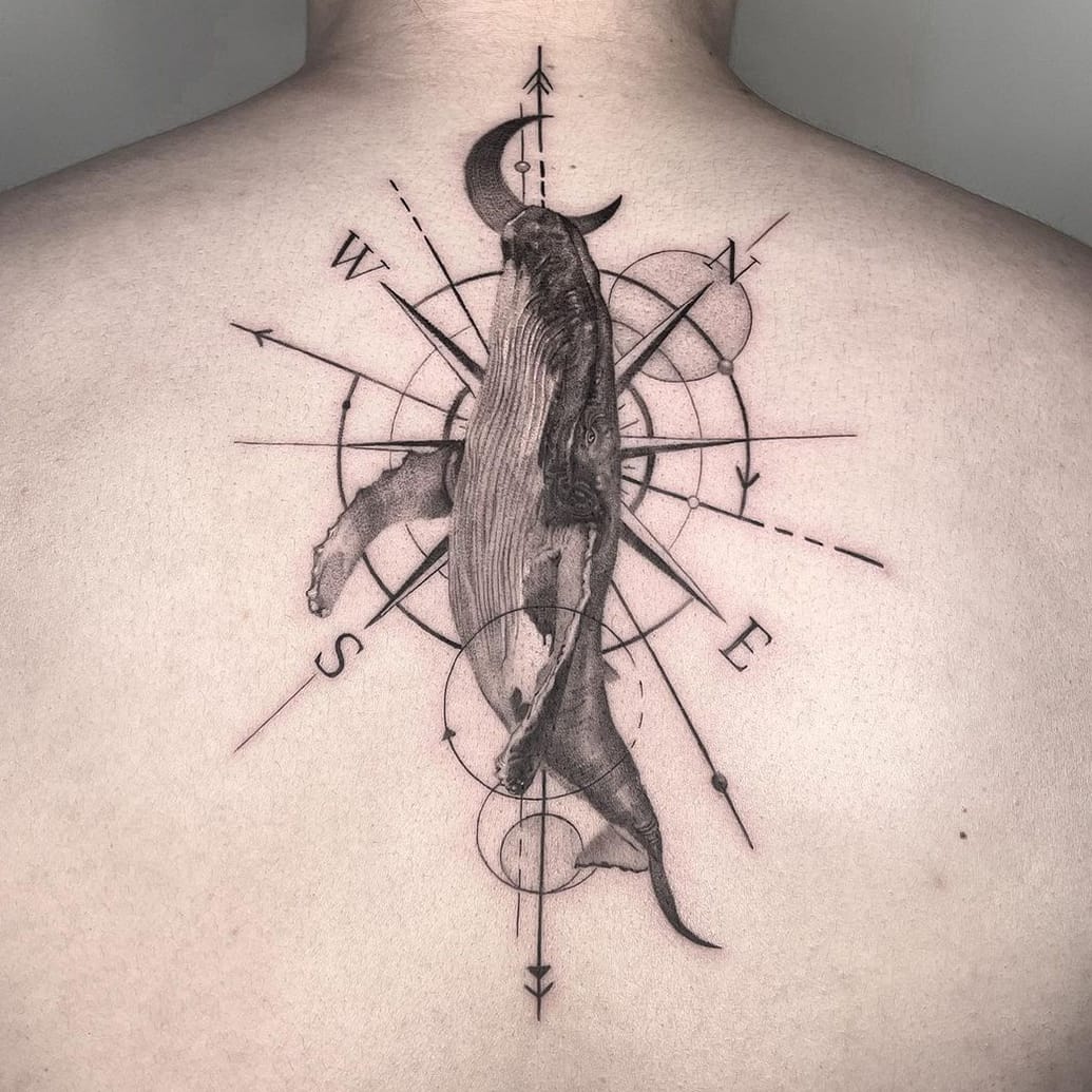 Whale and compass tattoo