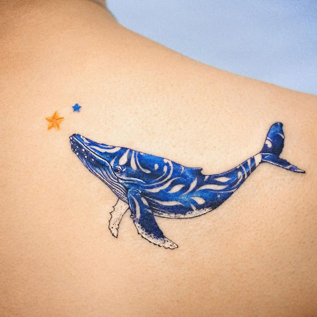 Whale print tattoo