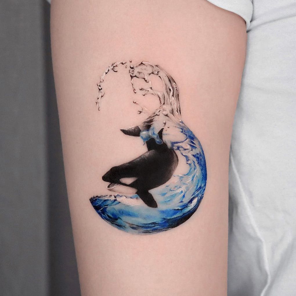 Whale wave tattoo