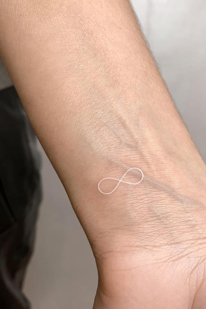 White ink infinity tattoo