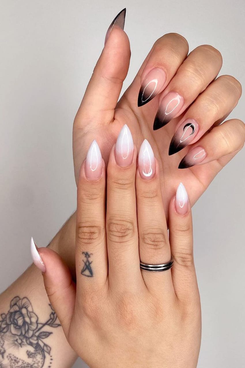 Black and white moon stiletto nails