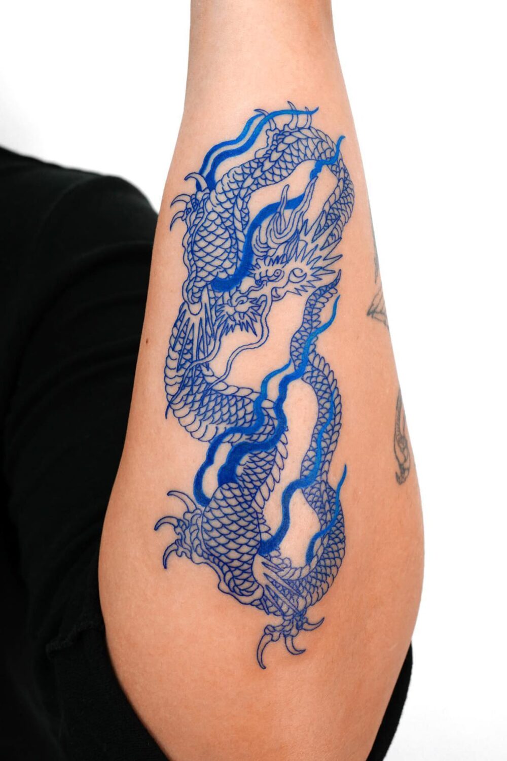 Blue Ink Dragon Tattoo