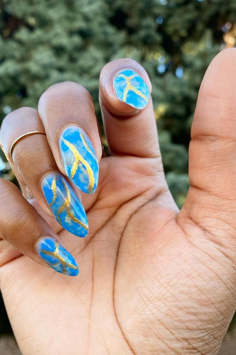 Blue and gold watercolor nails