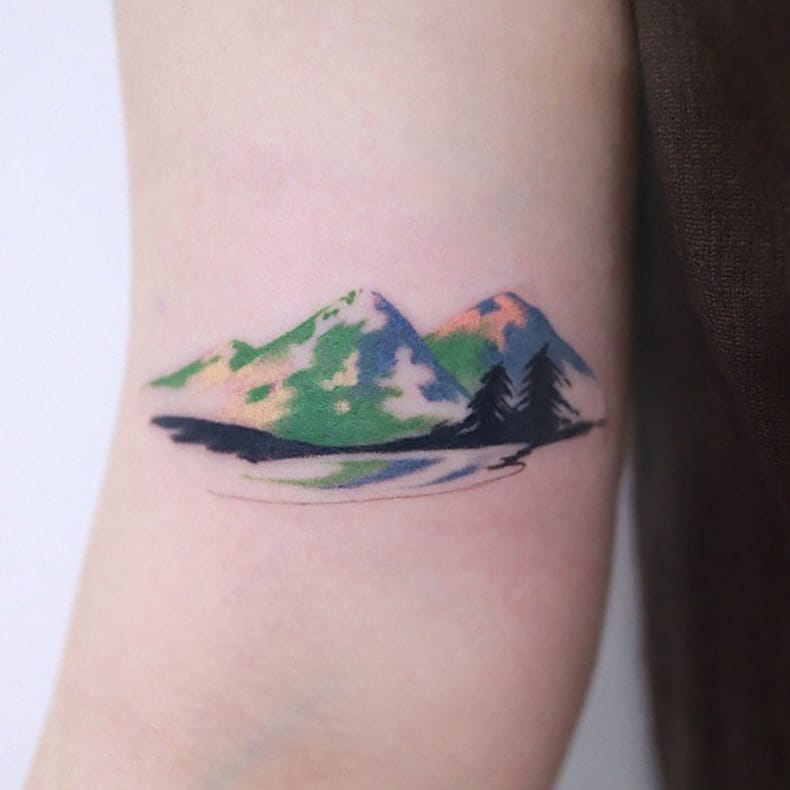 Colorful mountain tattoo