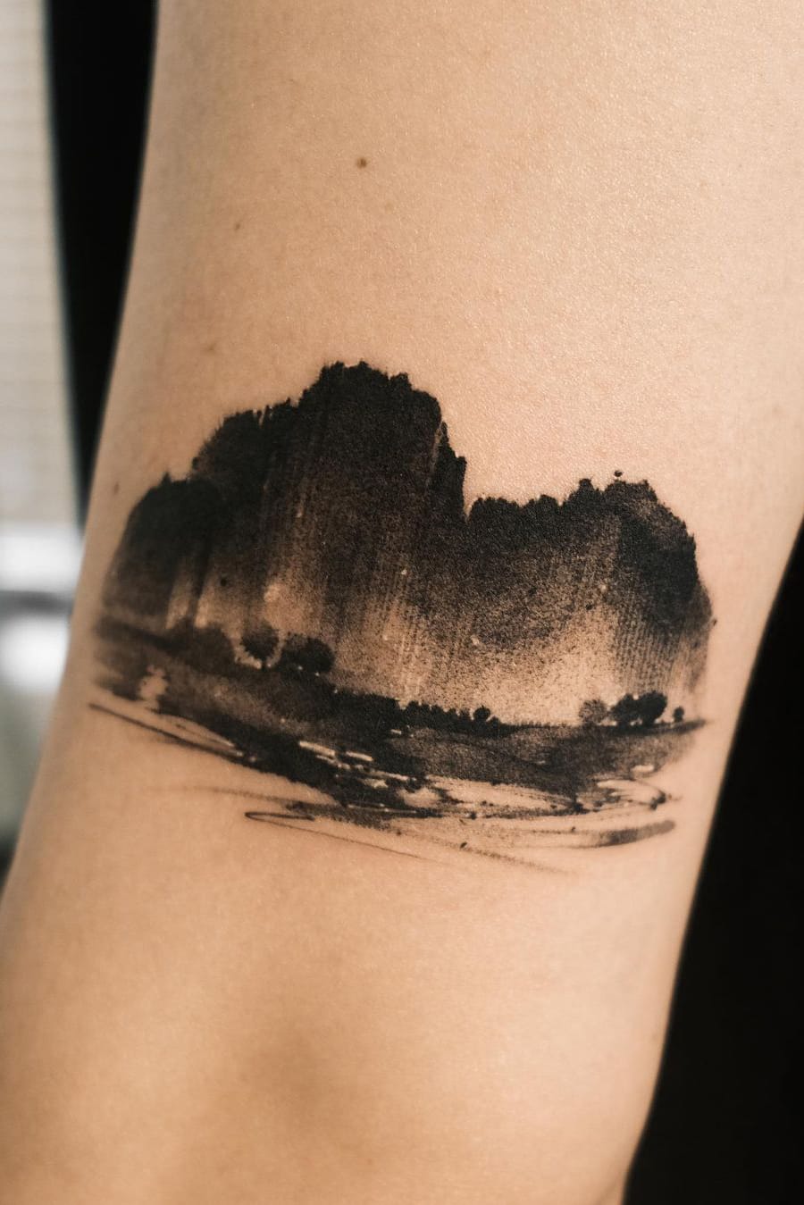 Ink painting mountain tattoo