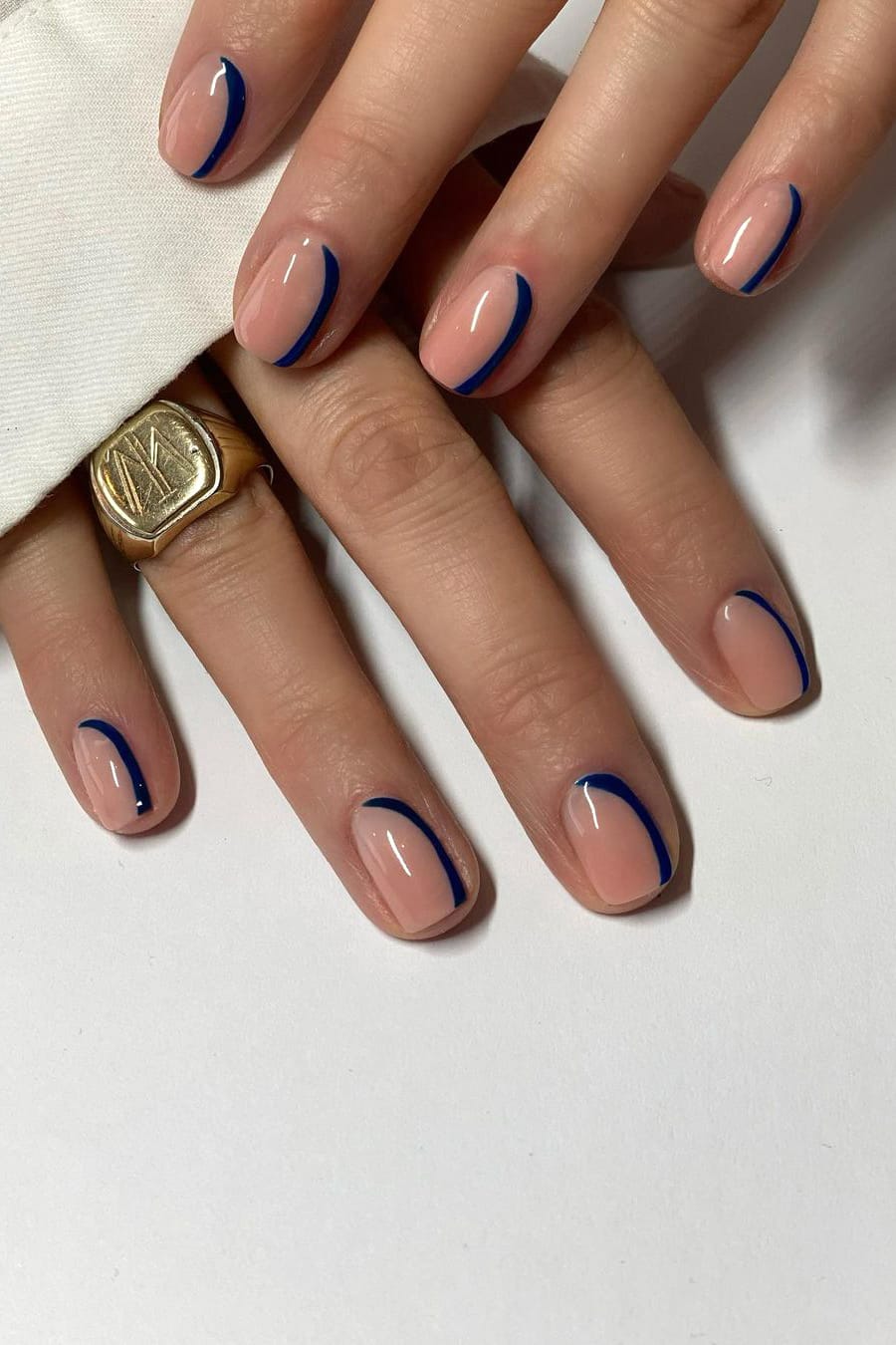 Nude and blue nails