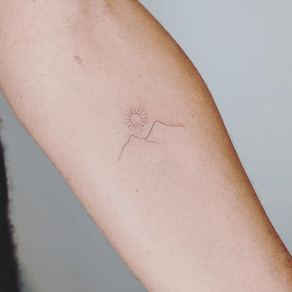 Simple mountain small tattoo