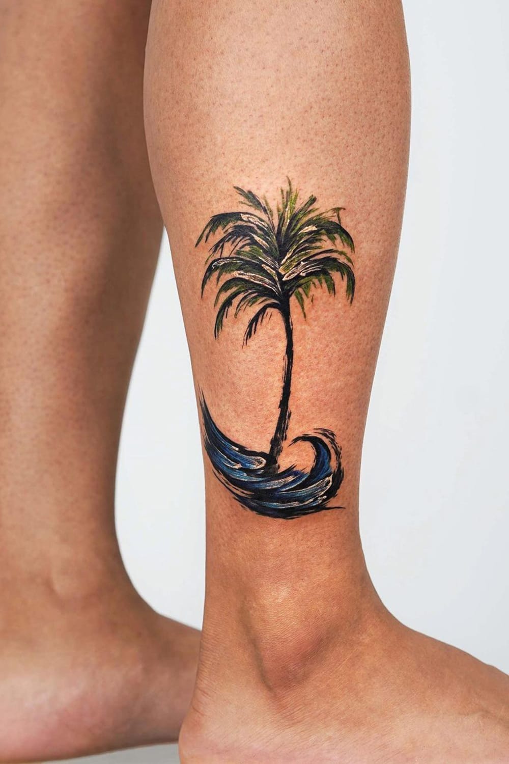 Wave and Palm Tree Tattoo