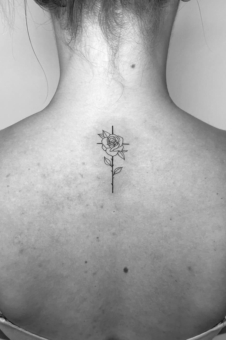 Small Cross Tattoo On Back