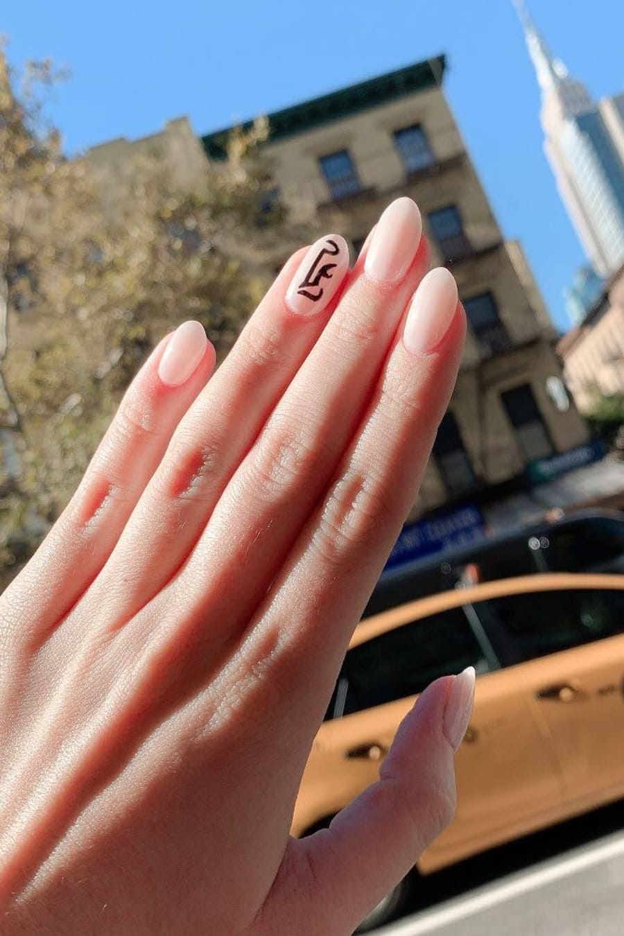 Almond Nails with Letter L
