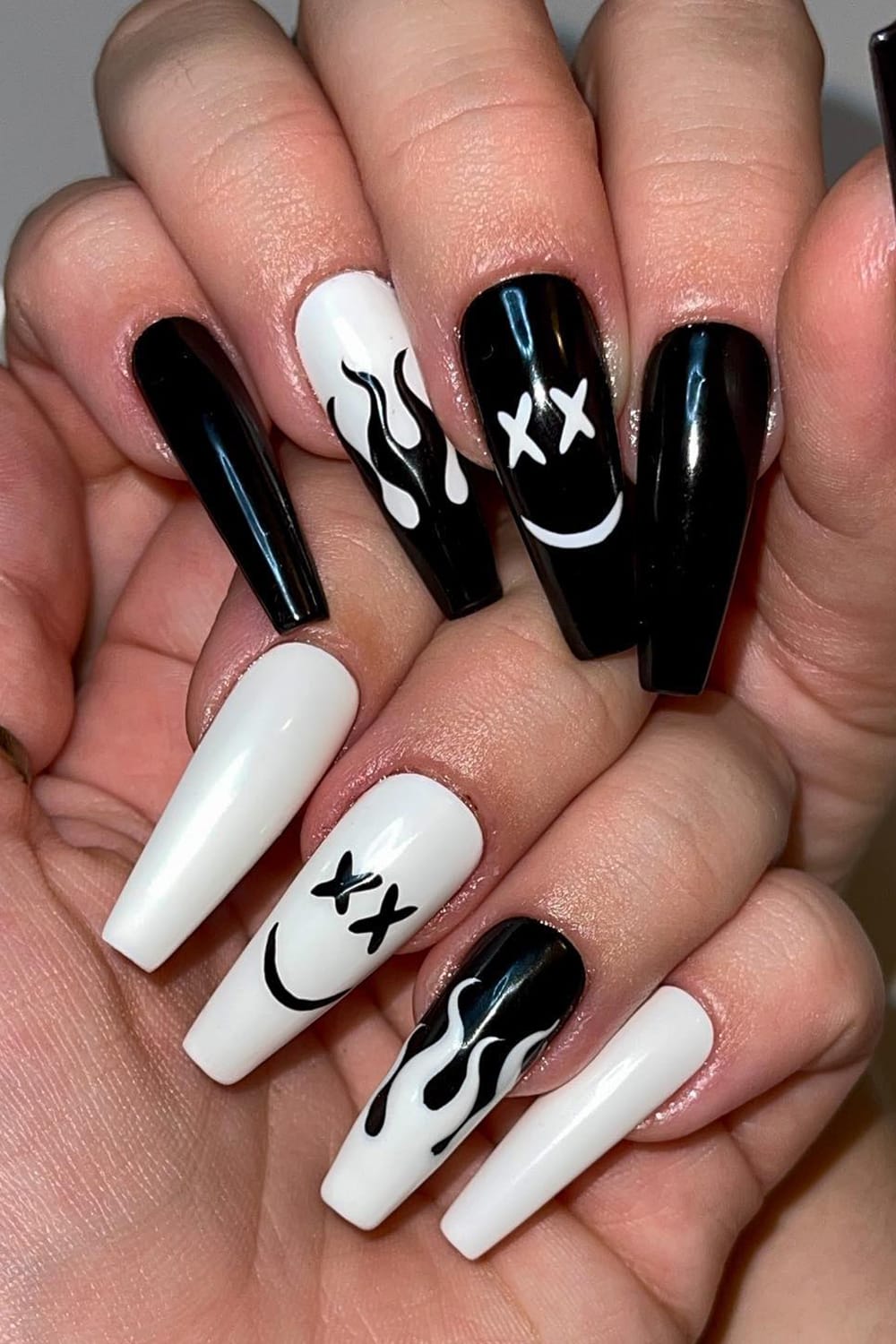 Black And White X Smiley Face Nails