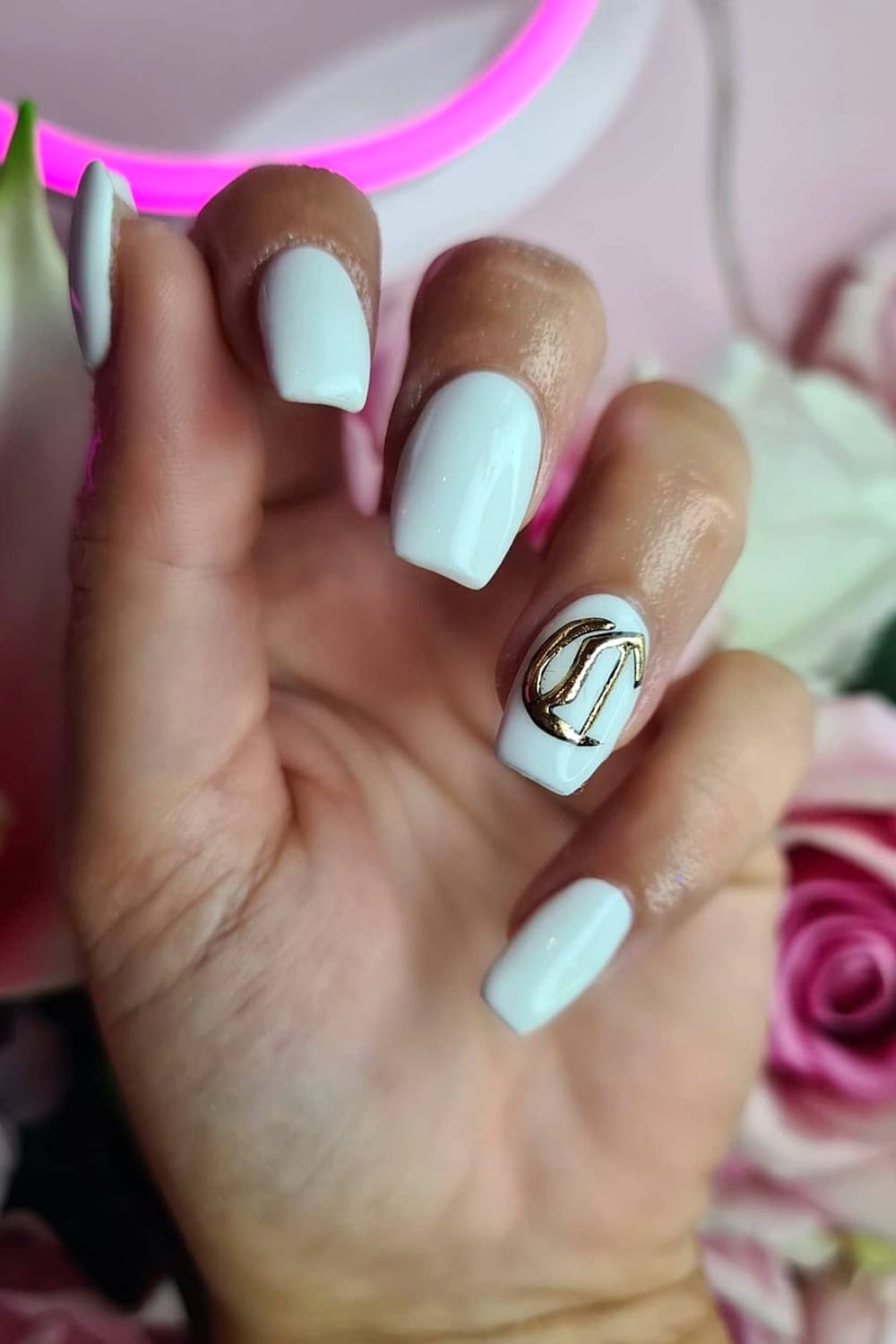 Nails with gold letter