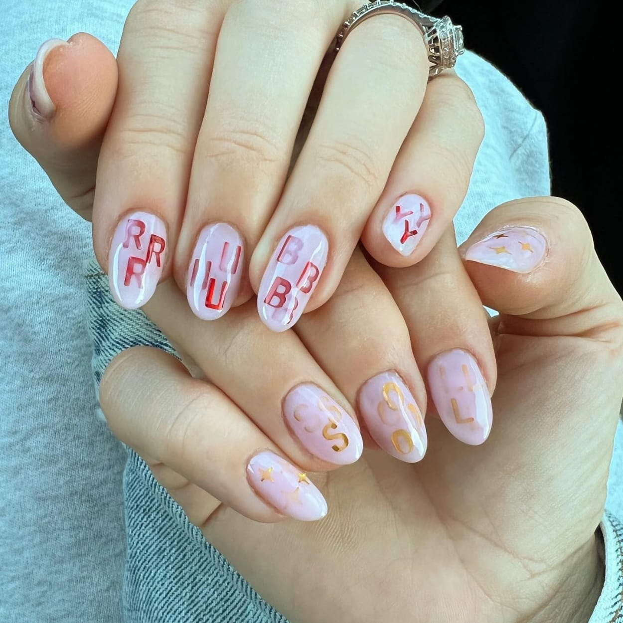 Nails with overlapping letters