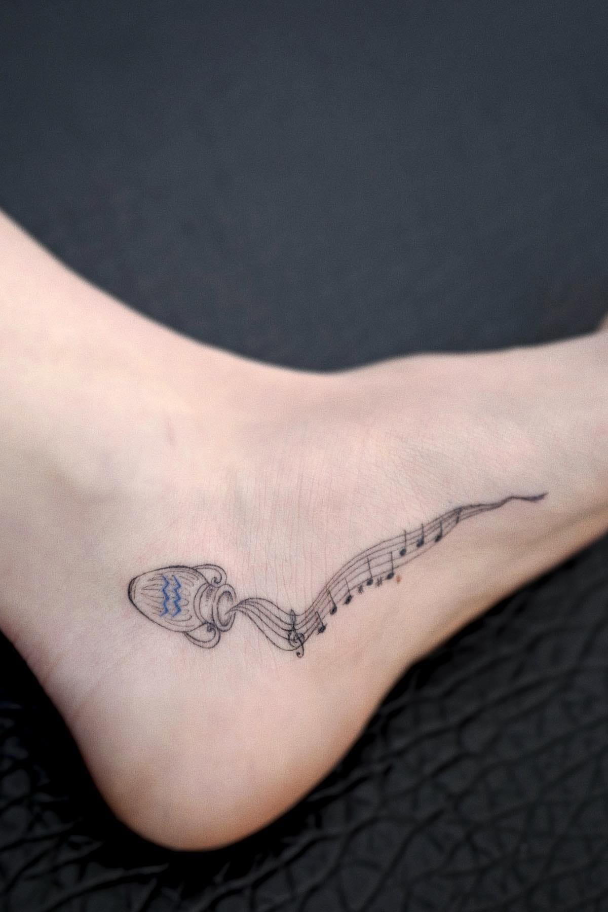 Aquarius tattoo