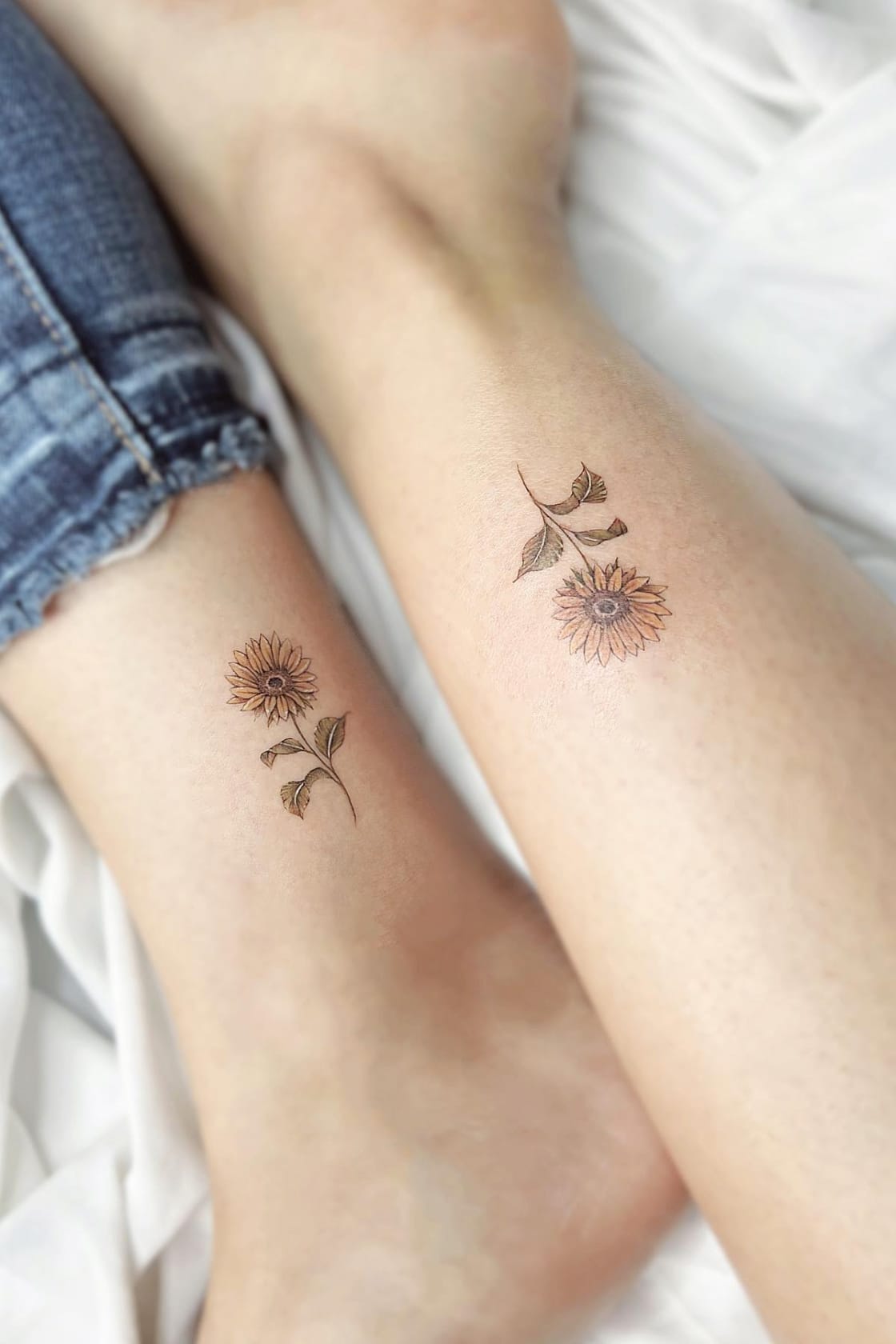 Small sunflower matching tattoo