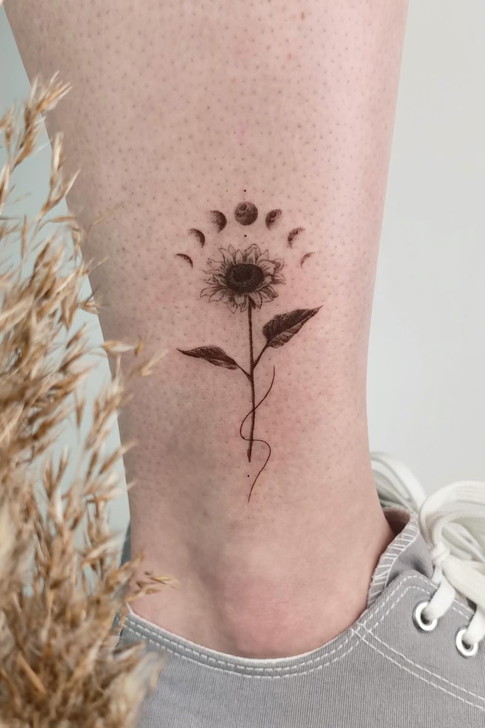 black and white small sunflower tattoo