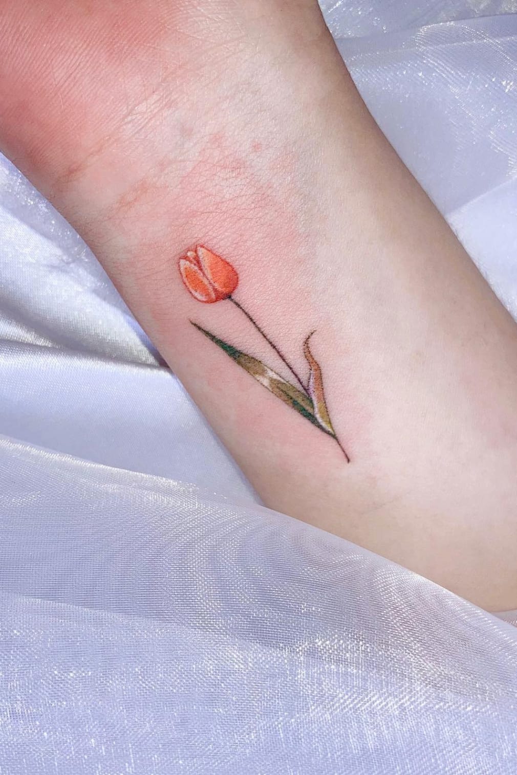 small follow tattoo