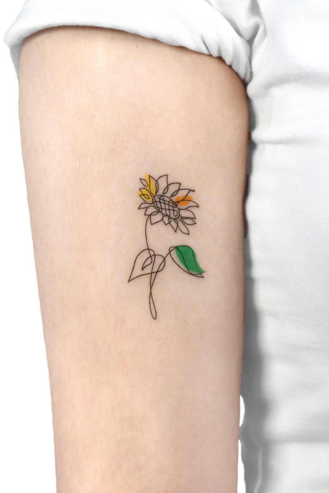 small watercolor sunflower tattoo