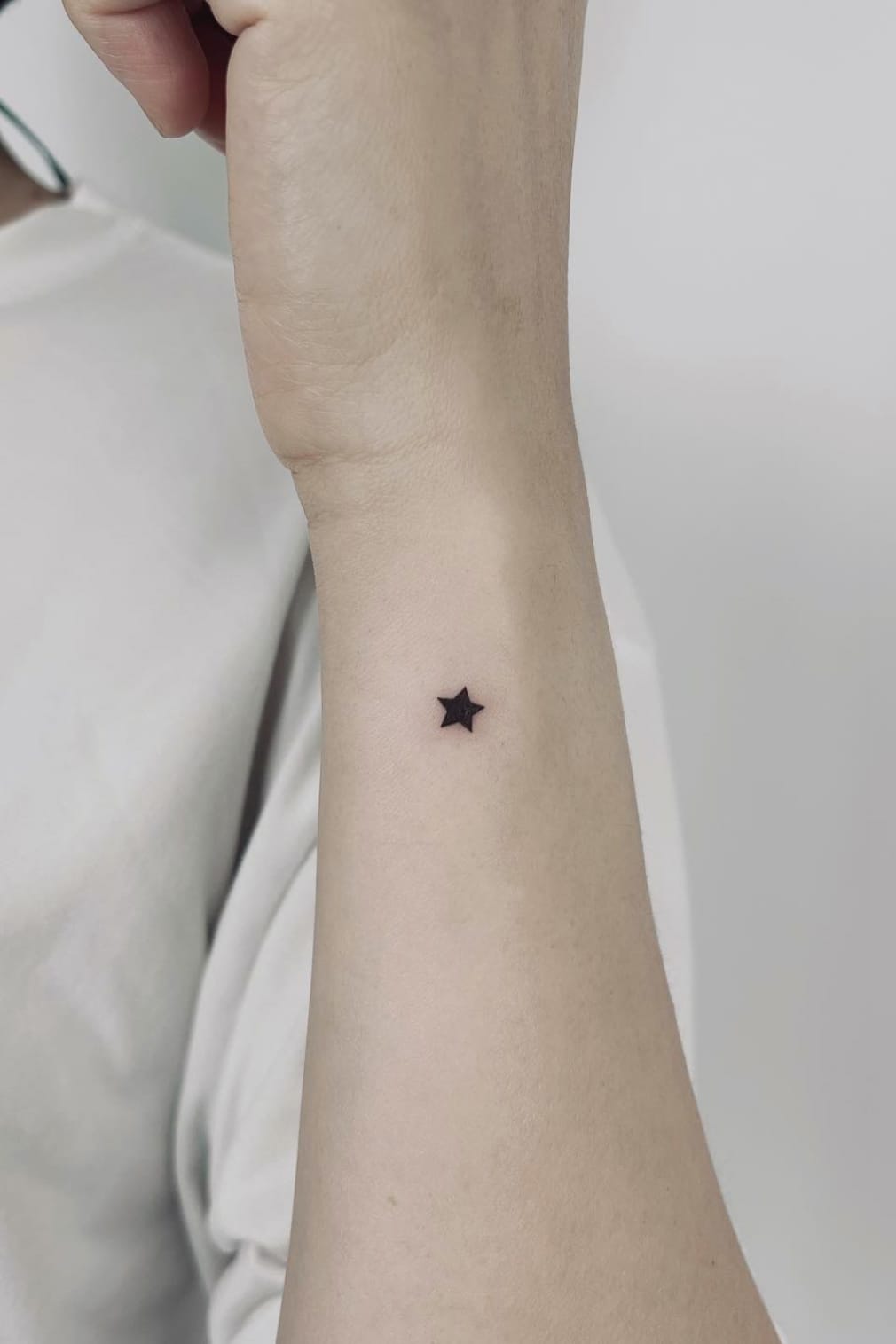 Small Five-pointed Star Tattoo