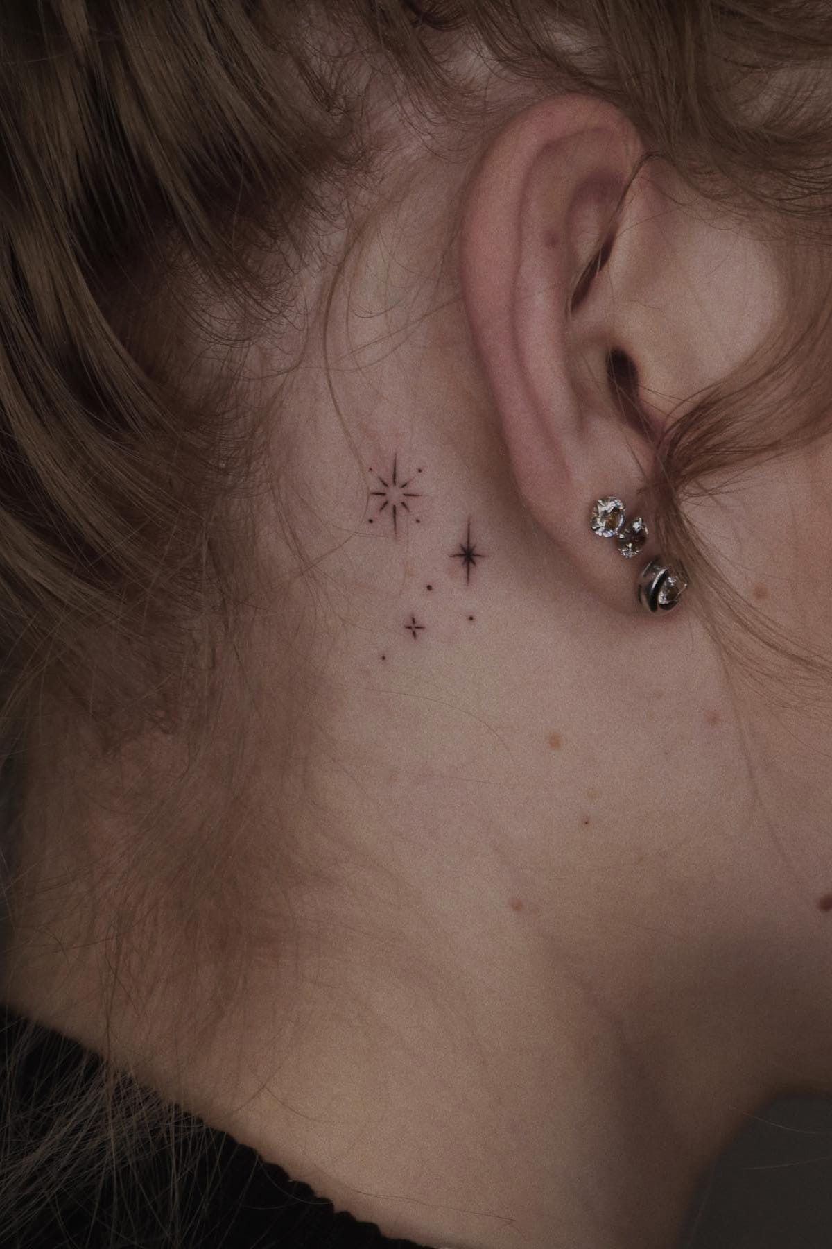 Small Star Tattoo Behind the Ear