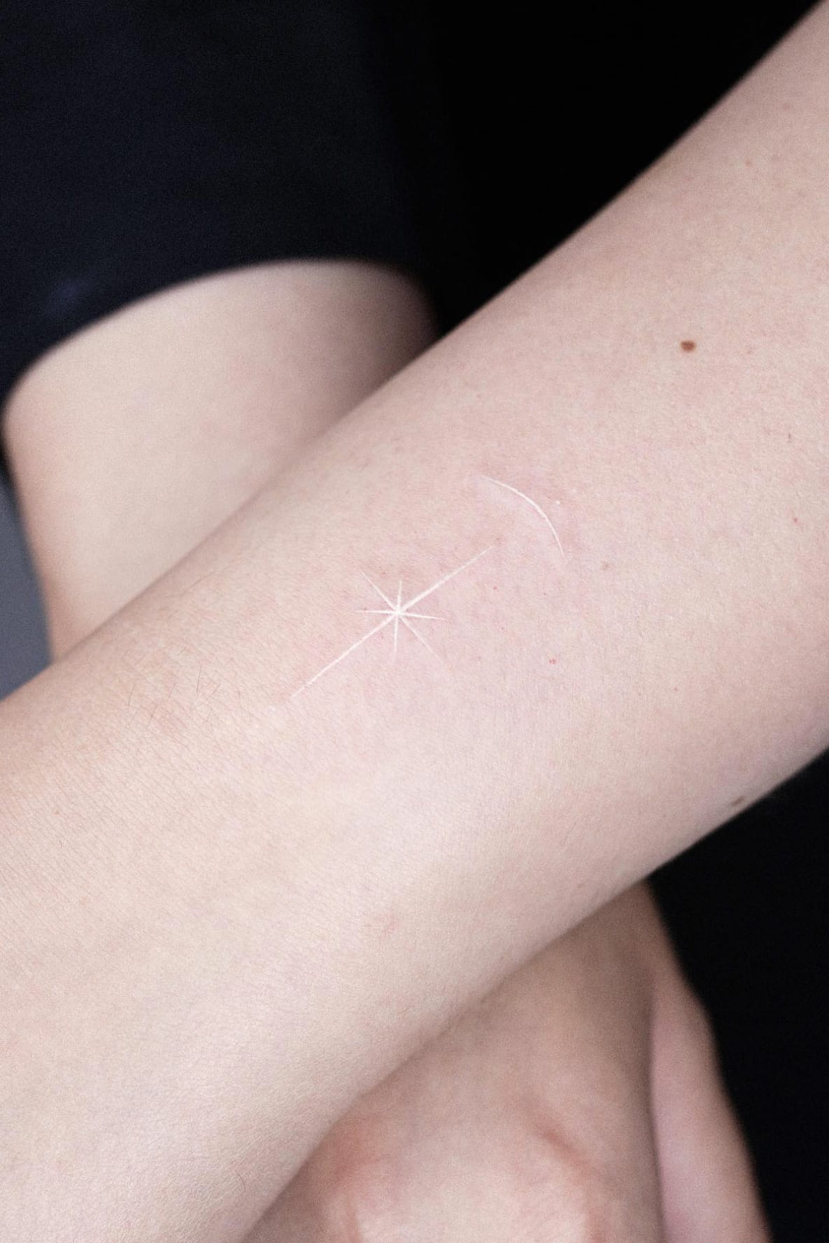 Small White Star Tattoo