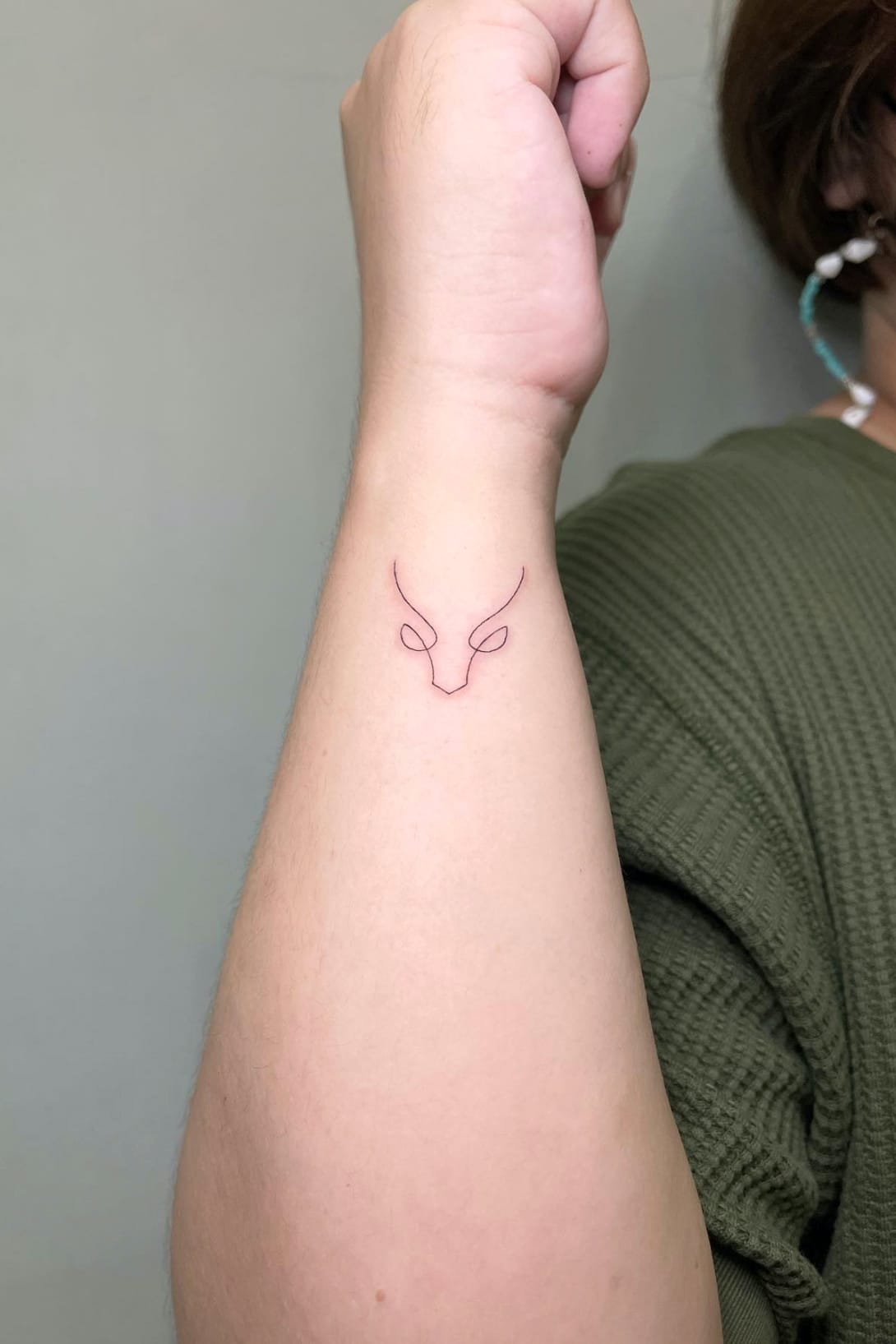 Minimalist Taurus Tattoo