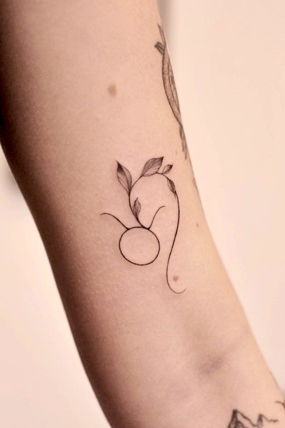 Thin Line Taurus Symbol Tattoo