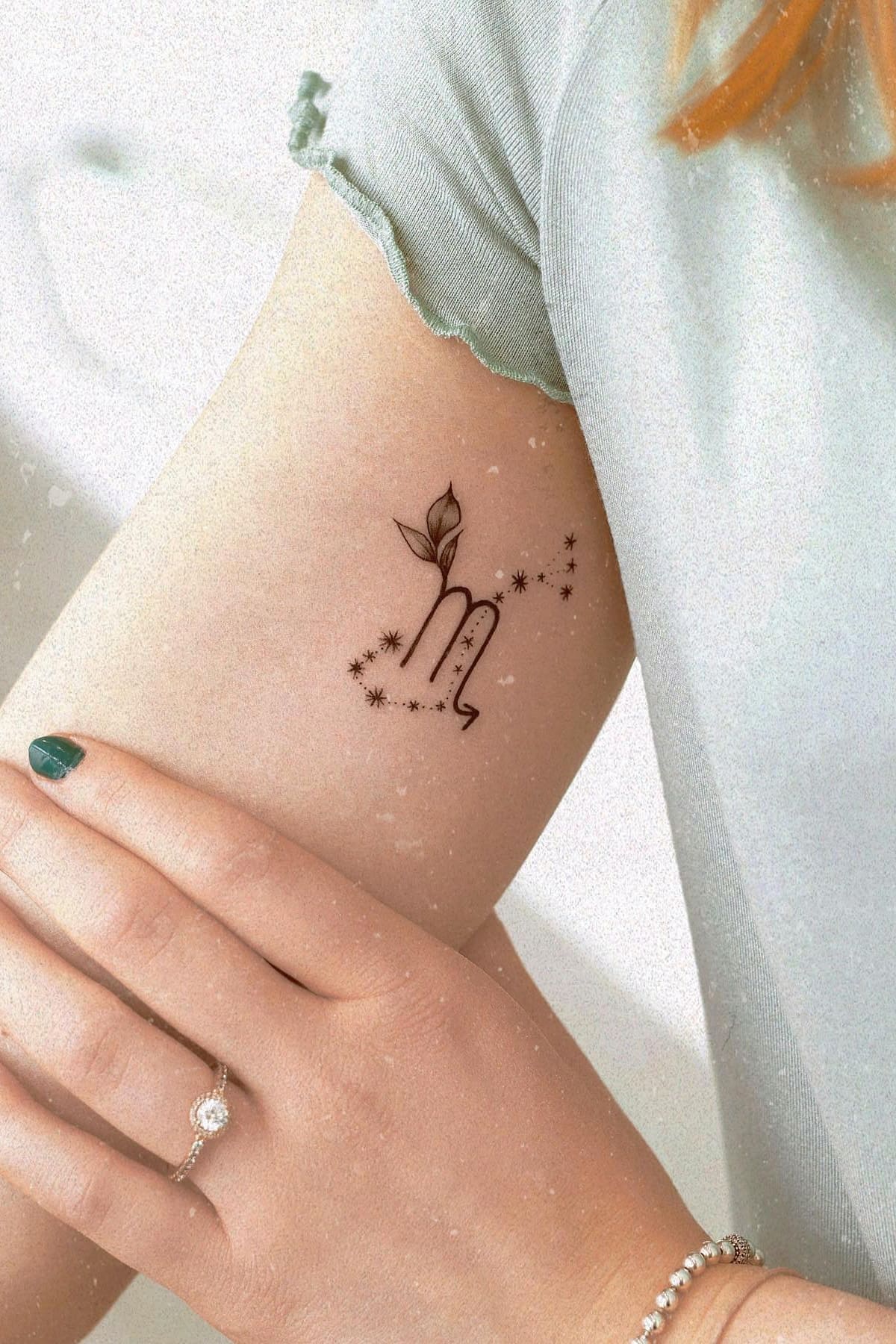 Elegant Scorpio Symbol Tattoo
