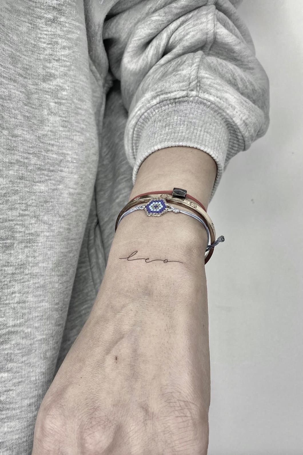 Leo Word Tattoo