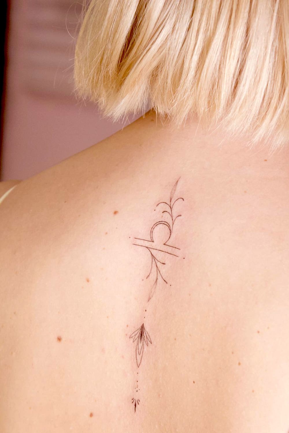 Libra Tattoo On the Back