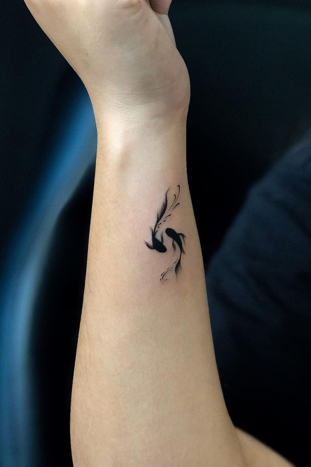 Pisces Tattoo on Wrist