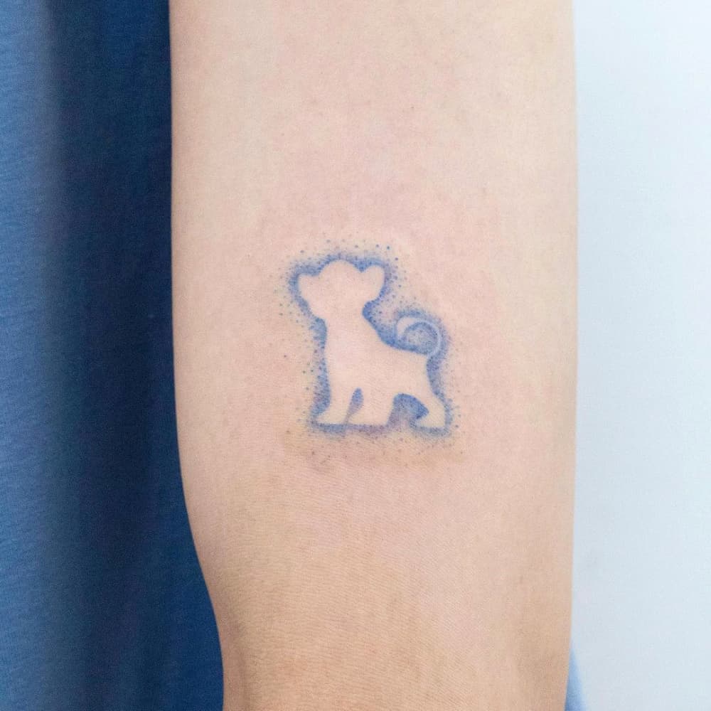 Little Lion Silhouette Tattoo