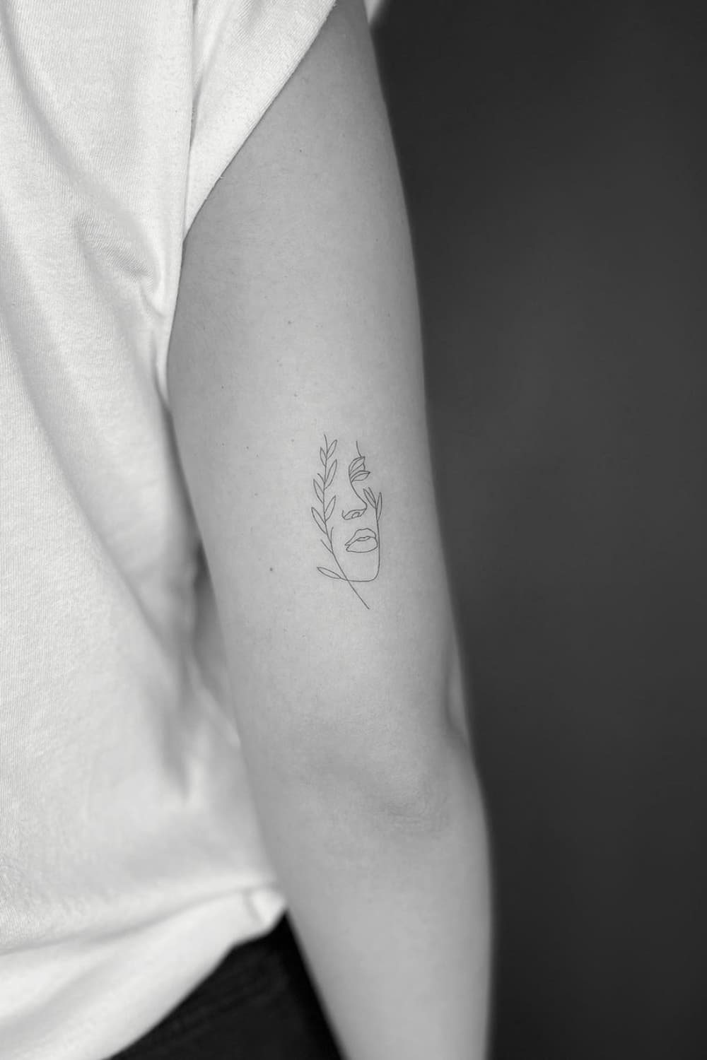 Face Silhouette Tattoo