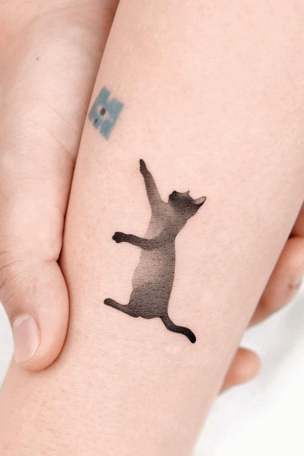 Cat Silhouette Tattoo
