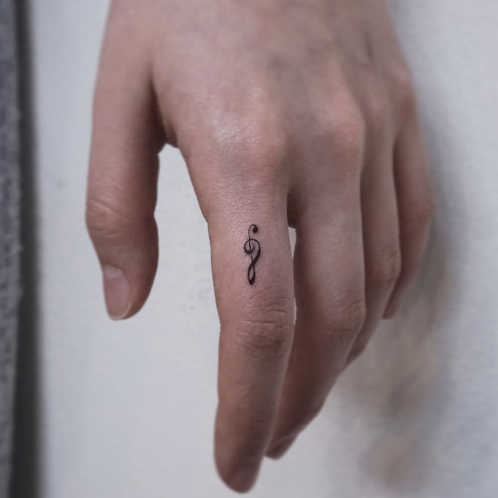 Small Music Note Tattoo