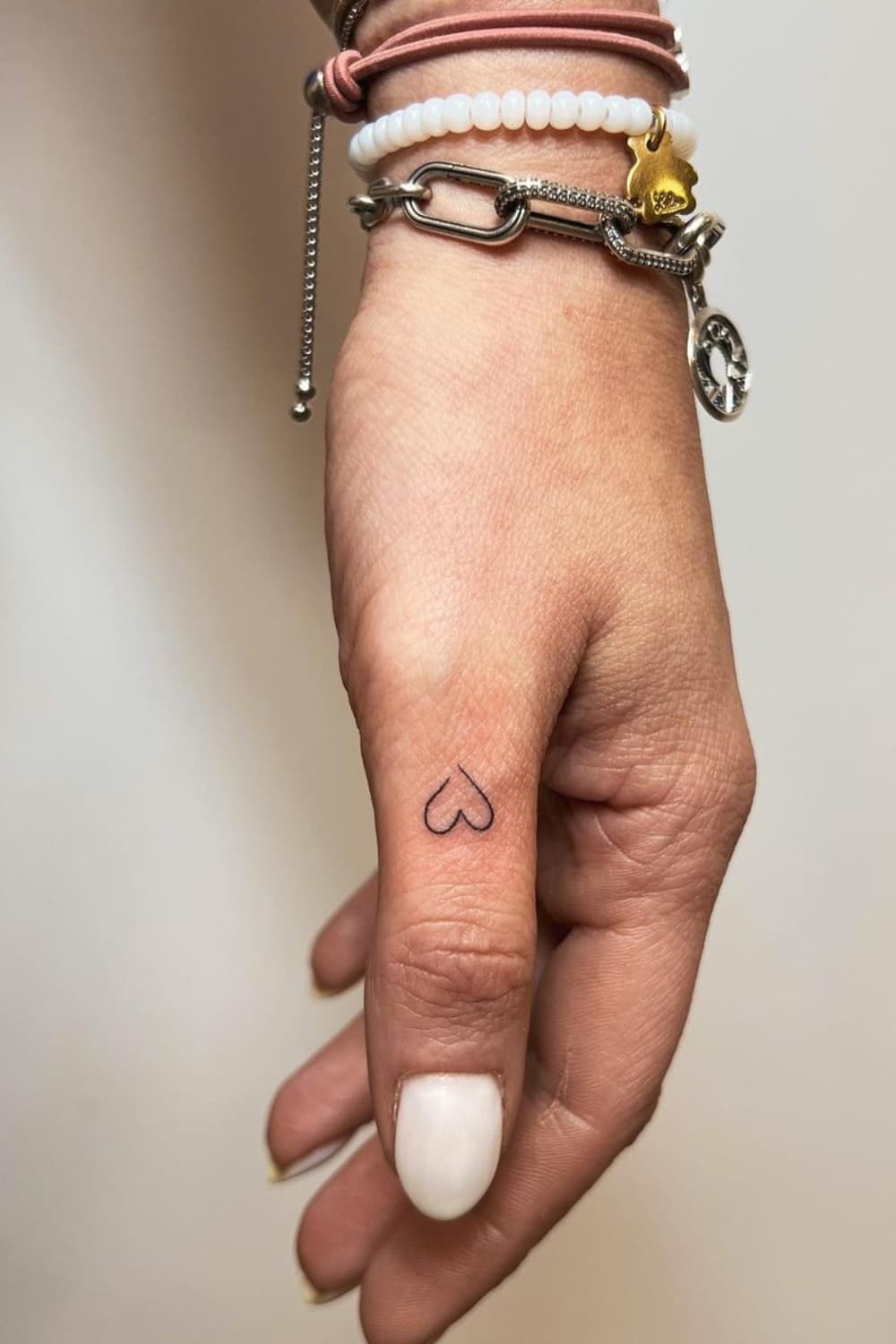 Fine Line Small Heart Tattoo