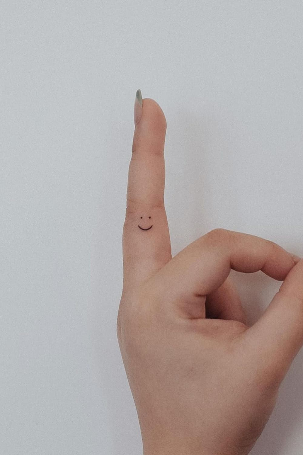 Mini Smiley tattoo