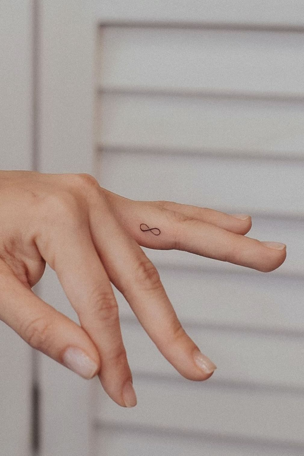 Tiny Infinity Symbol tattoo