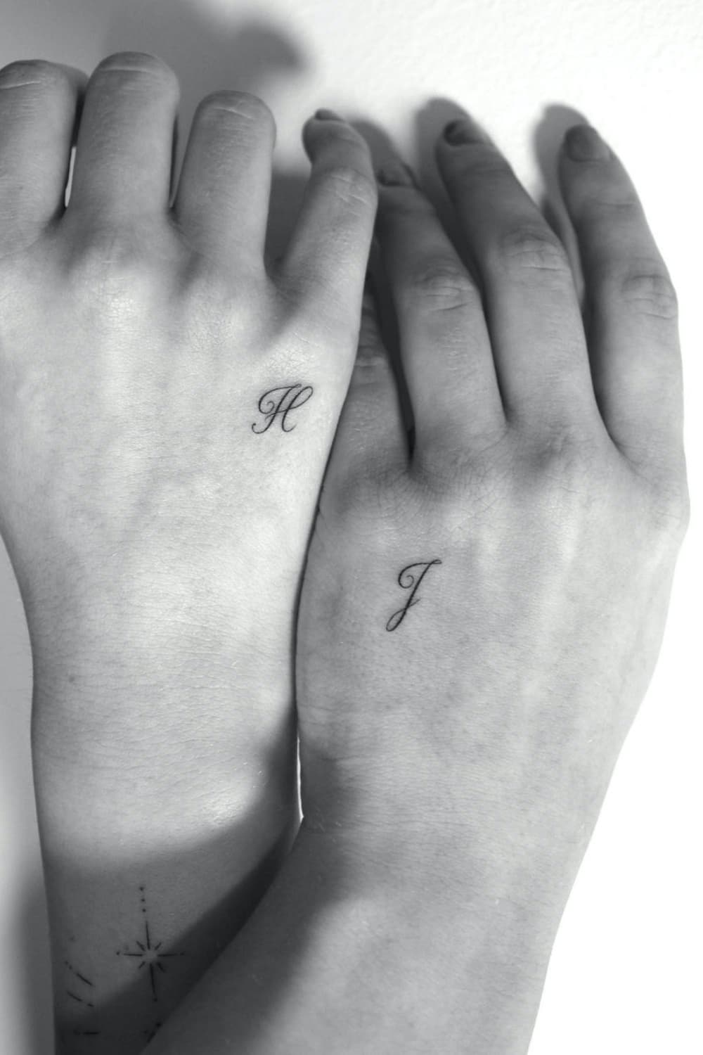 Small Couple Hand Tattoo