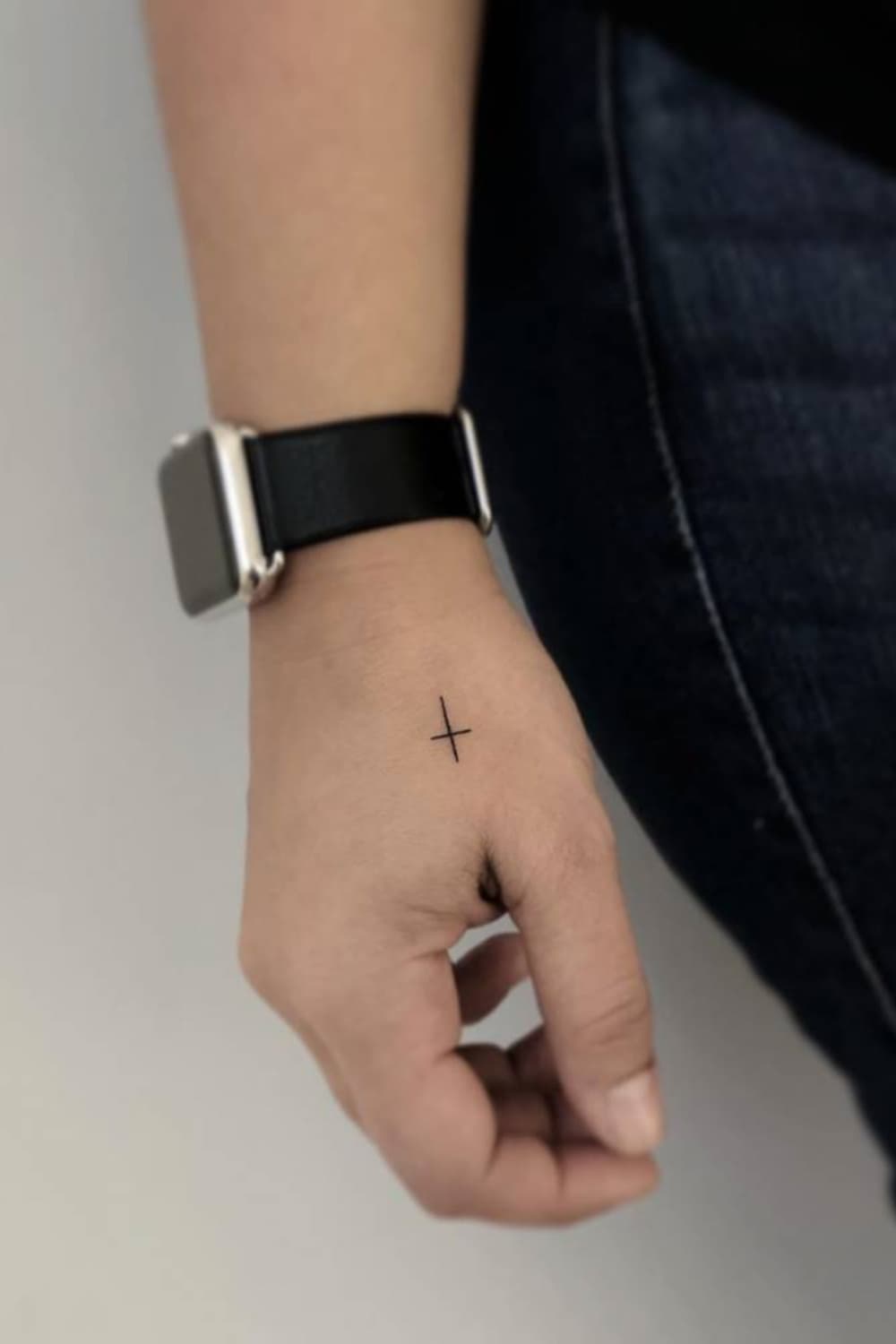 Small Cross Hand Tattoo