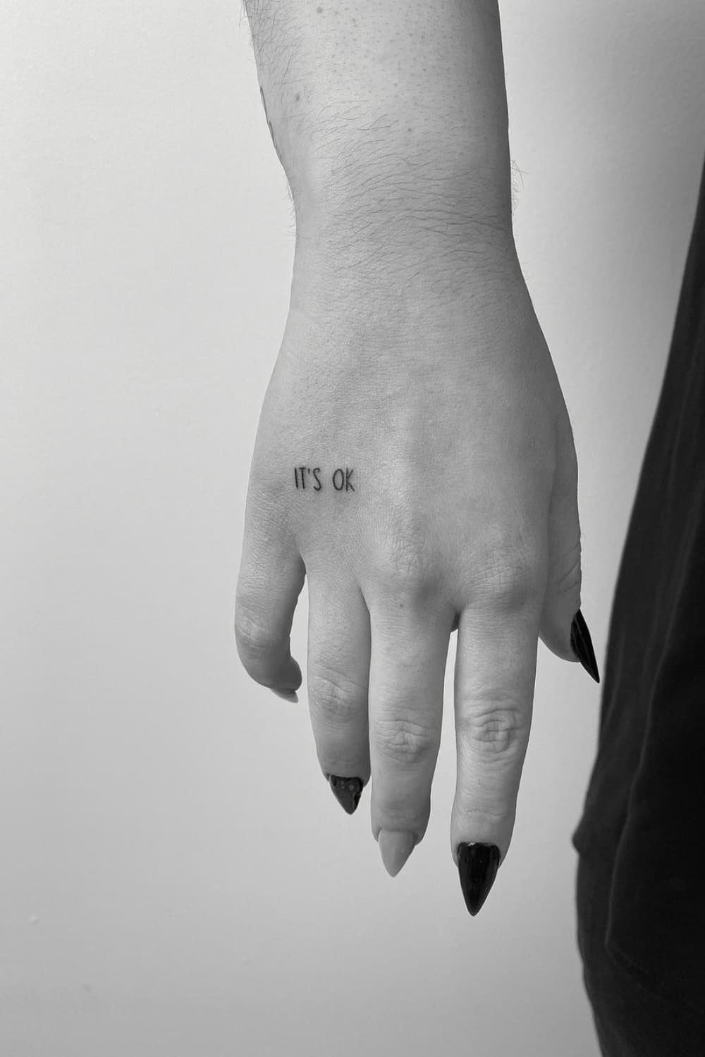 Small Quote Hand Tattoo