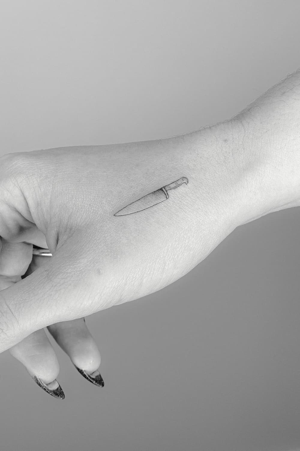 Small Knife Hand Tattoo