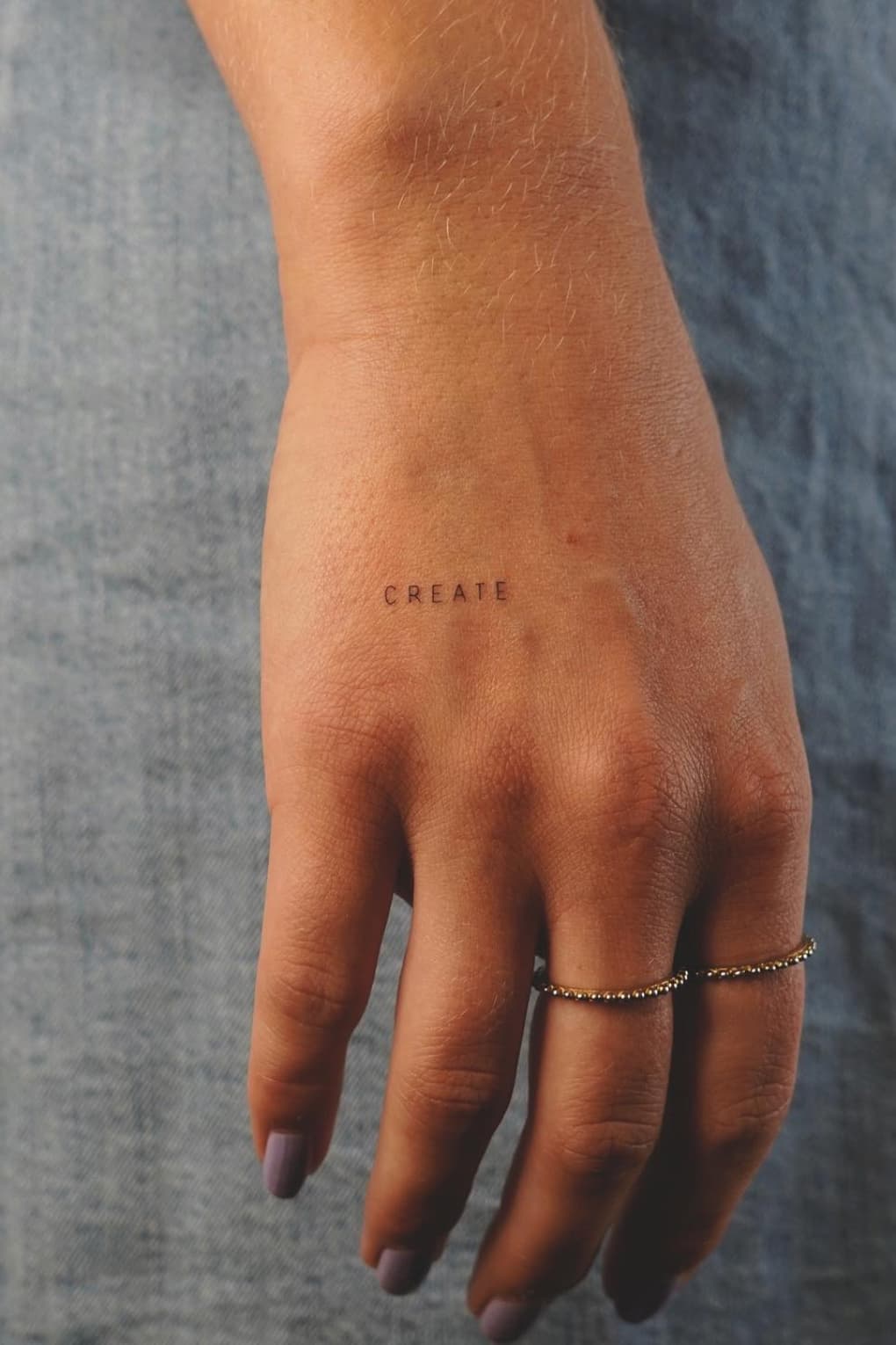 Small word Hand Tattoo