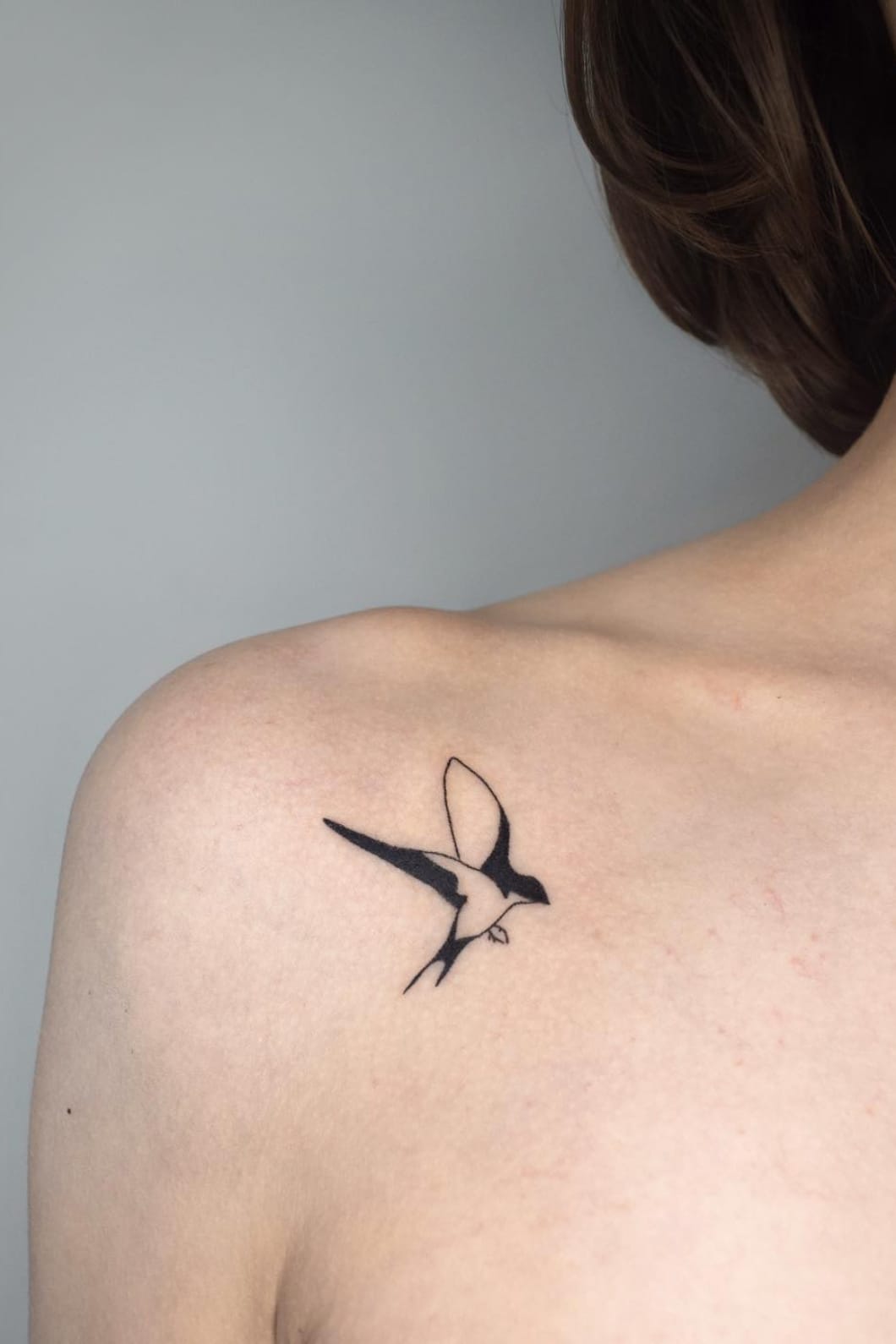 Swallow Silhouette Tattoo