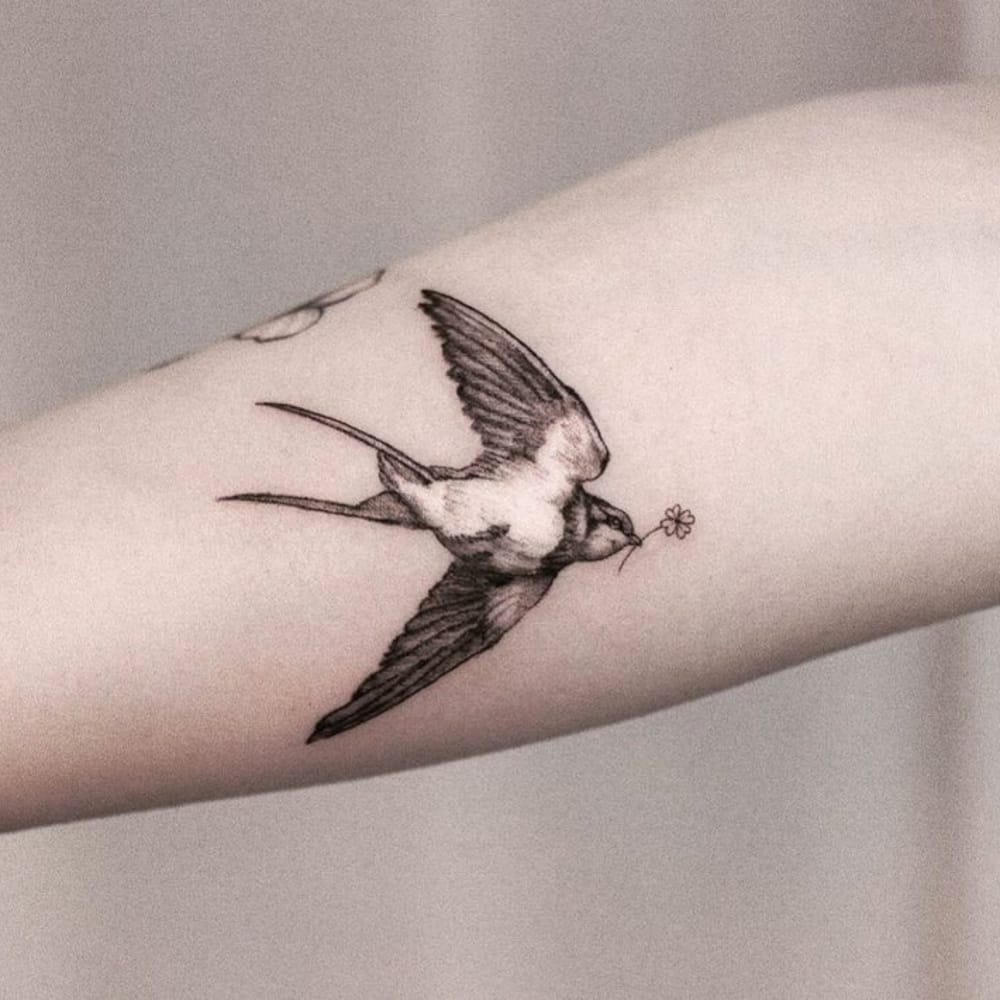 Swallow Tattoo With Four Leaf Clover